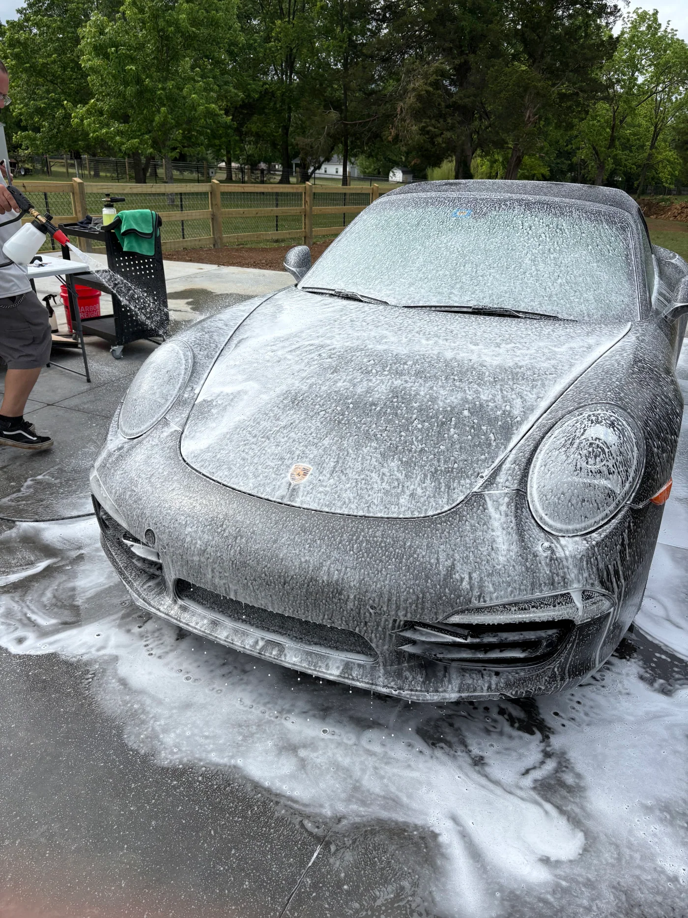 Porsche 911 covered in foam during the Sneaky Clean wash process