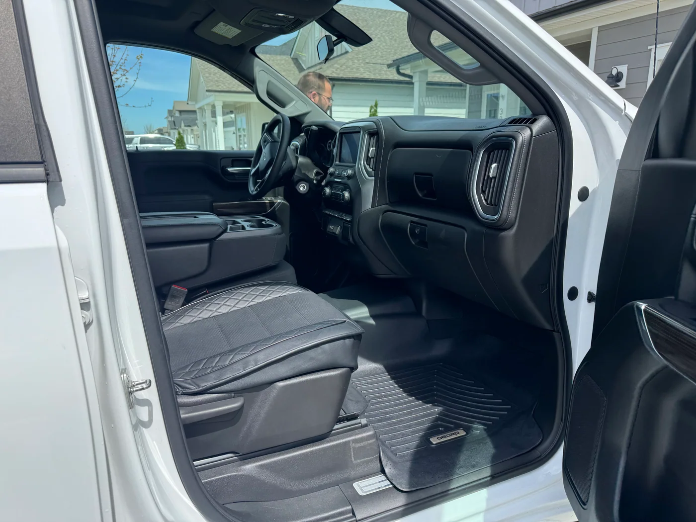 Passenger-side dashboard and footwell after interior detailing