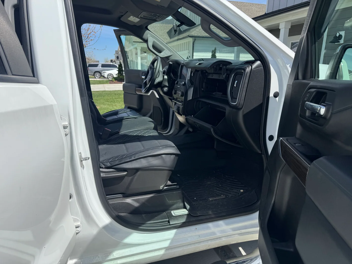 Passenger-side dashboard and footwell before interior detailing