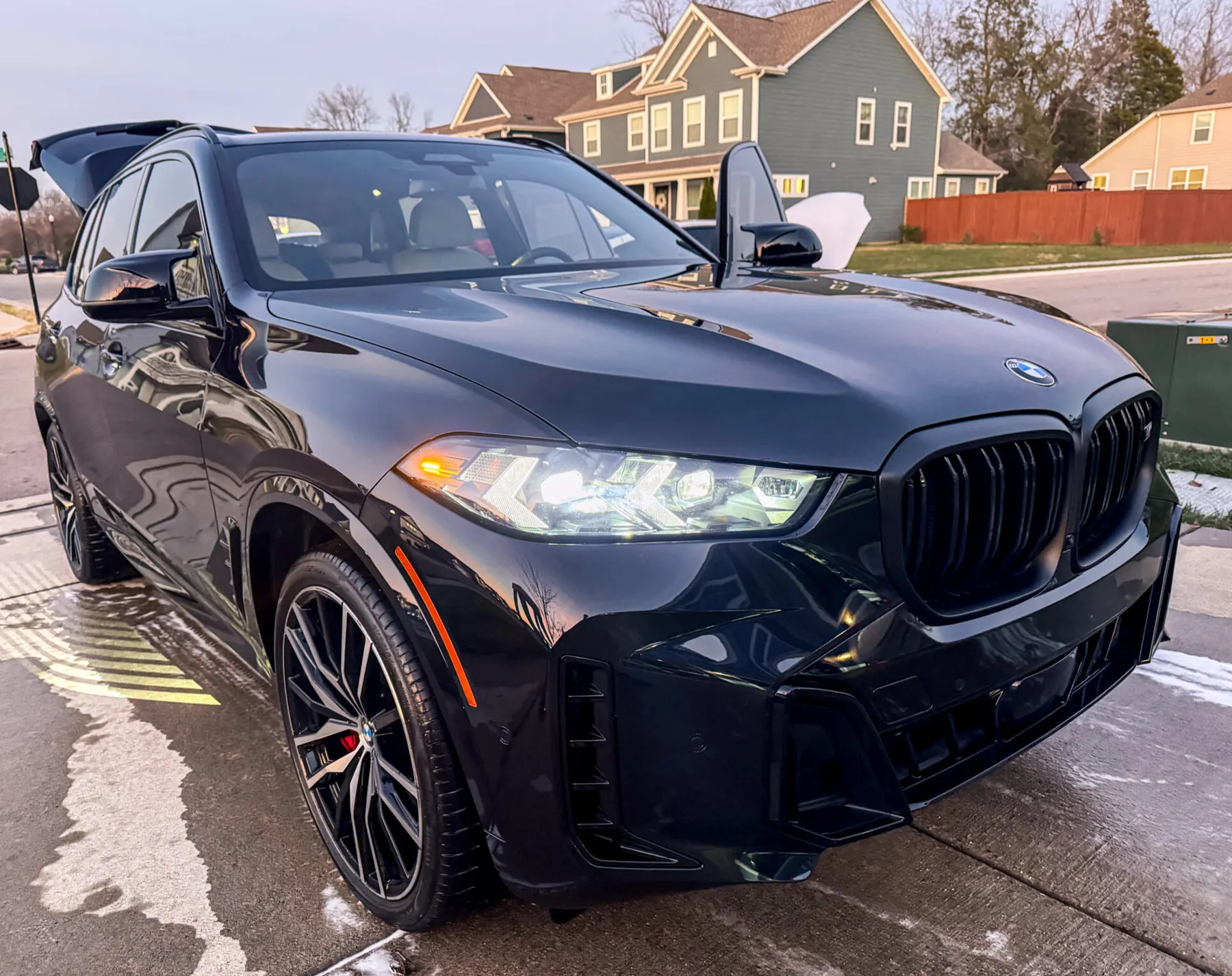 Black BMW cleaned by Sneaky Clean